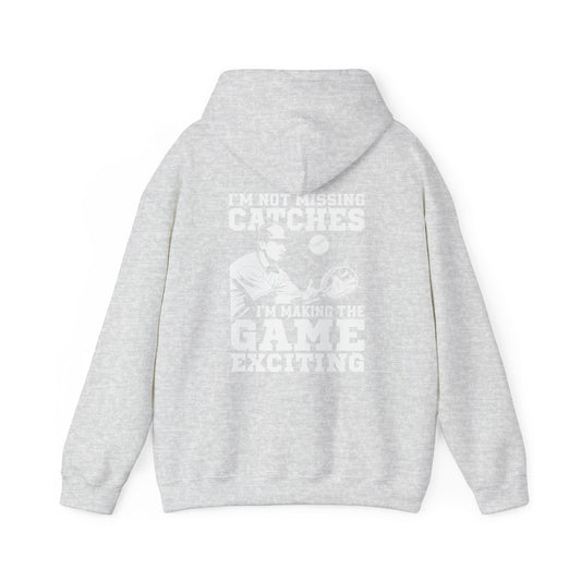 Proify, "I dont missing catches I making the game exciting" Unisex Heavy Blend™ Hooded Sweatshirt